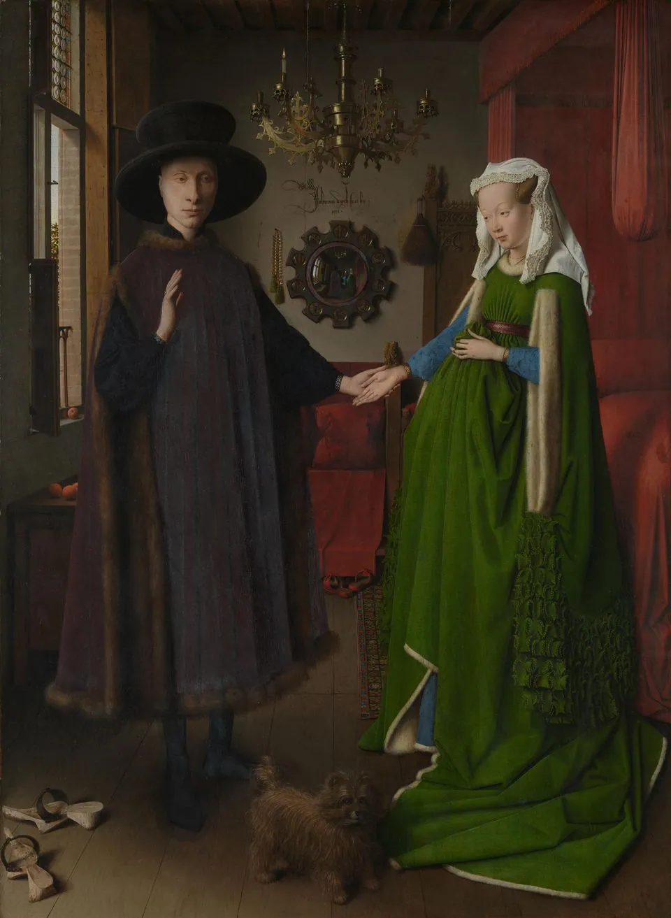 Jan van Eyck’s Arnolfini Portrait: a man in a wide black hat and a woman in a green dress hold hands in a room, a round mirror on the wall between them.